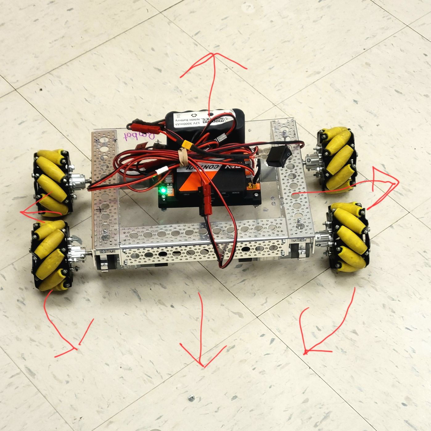 Mecanum-drive chassis with motion arrows drawn around it